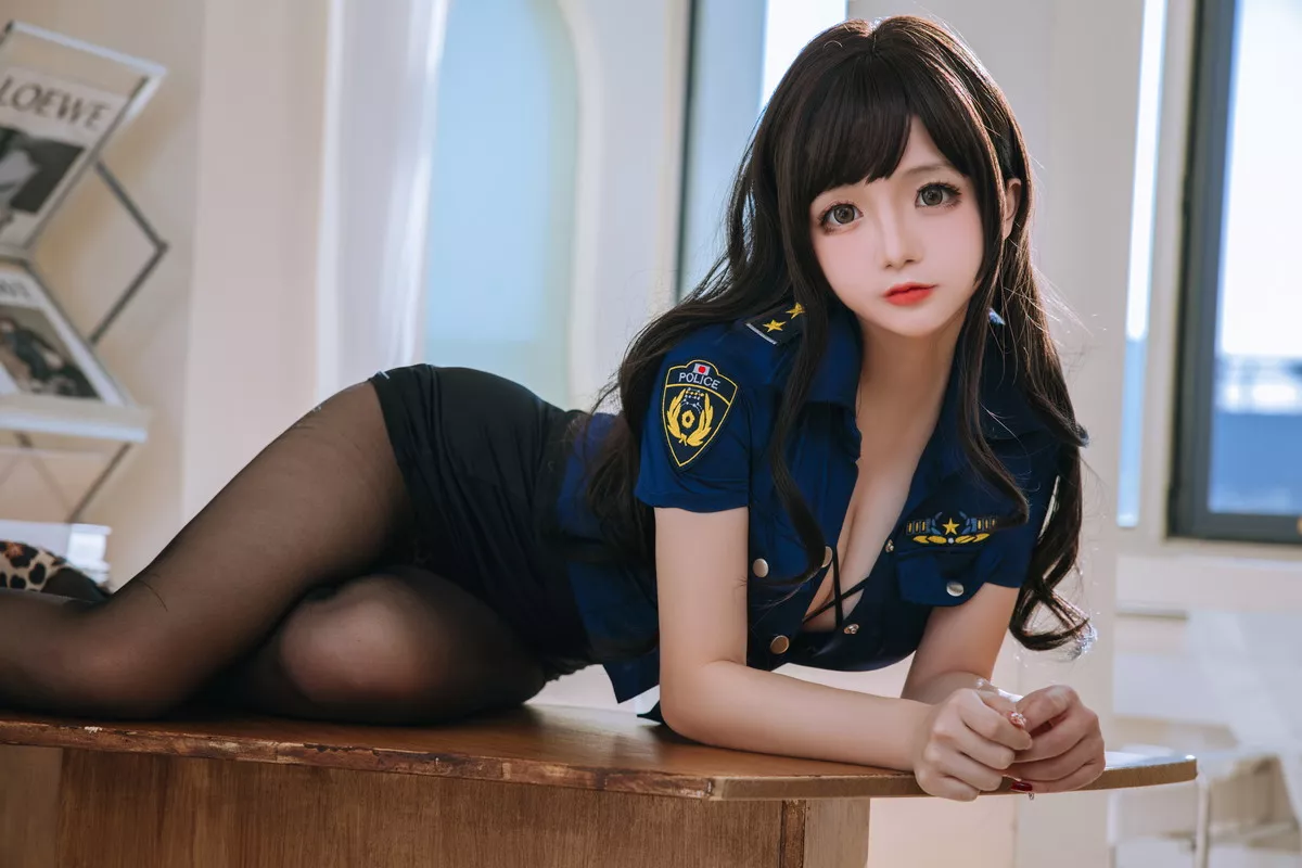 Xgyw.Org_Cosplay美女日奈娇豹纹女警主题蓝上衣配黑短裙半脱露豹纹内衣丰满诱惑写真109P